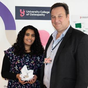 Olwen Starr Award for Customer Service - Husaina Waliji pictured with Charles Hunt