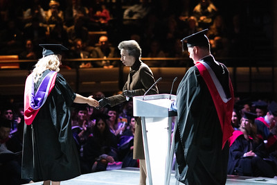 HRH The Princess Royal presenting a graduate with an award
